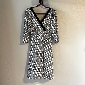 Midi black and white polka dot dress.